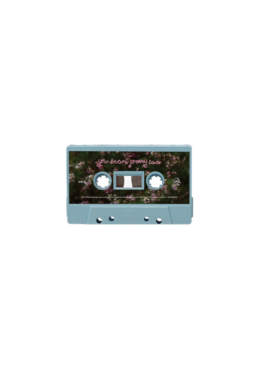 You seem pretty sad for a girl so in love: Baby blue cassette